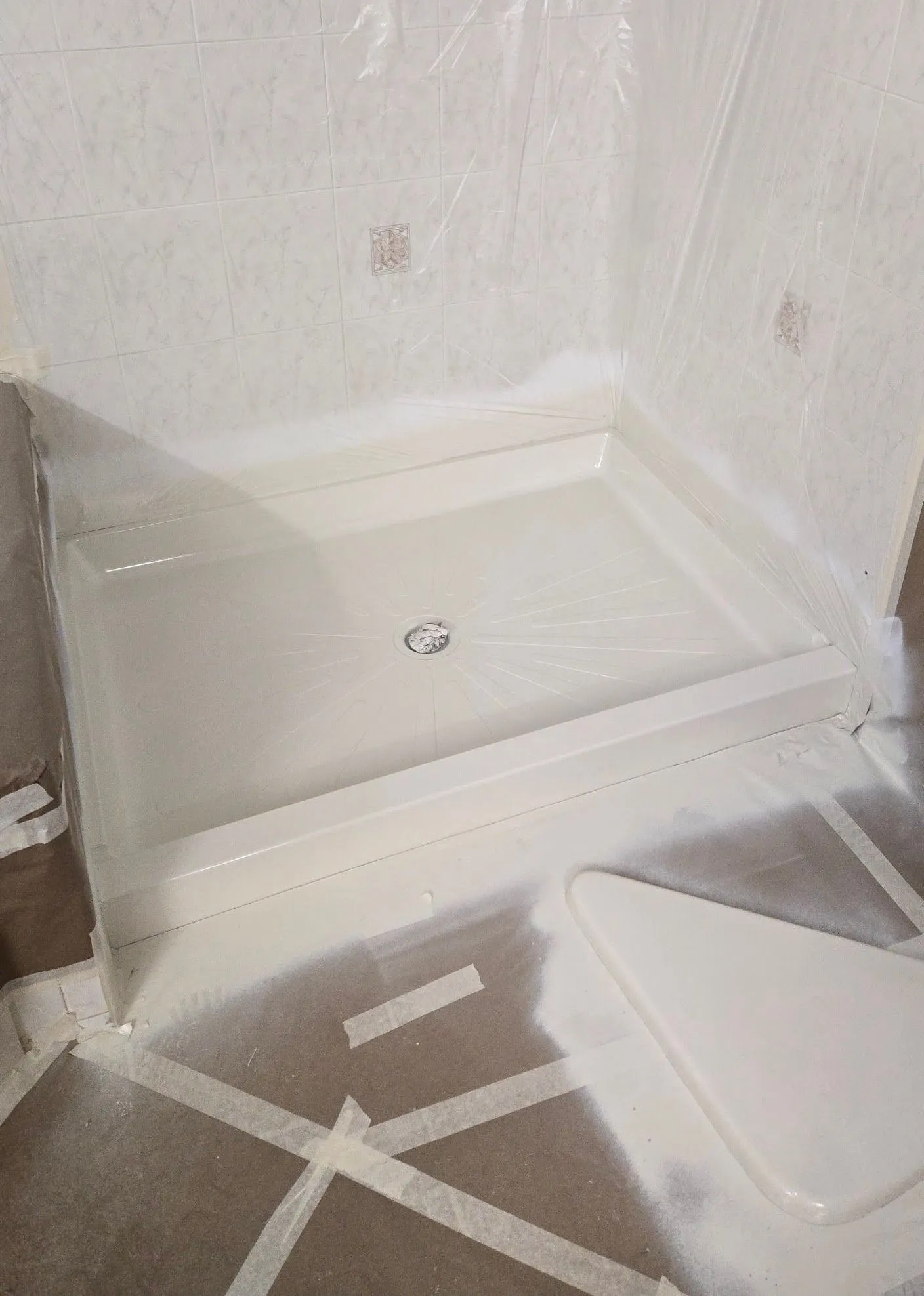 Shower base refinishing service by ProTech Recoating in Oak Forest IL